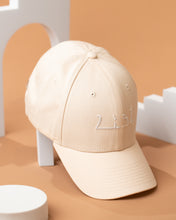 Load image into Gallery viewer, Cream and White ARYA Baseball Cap